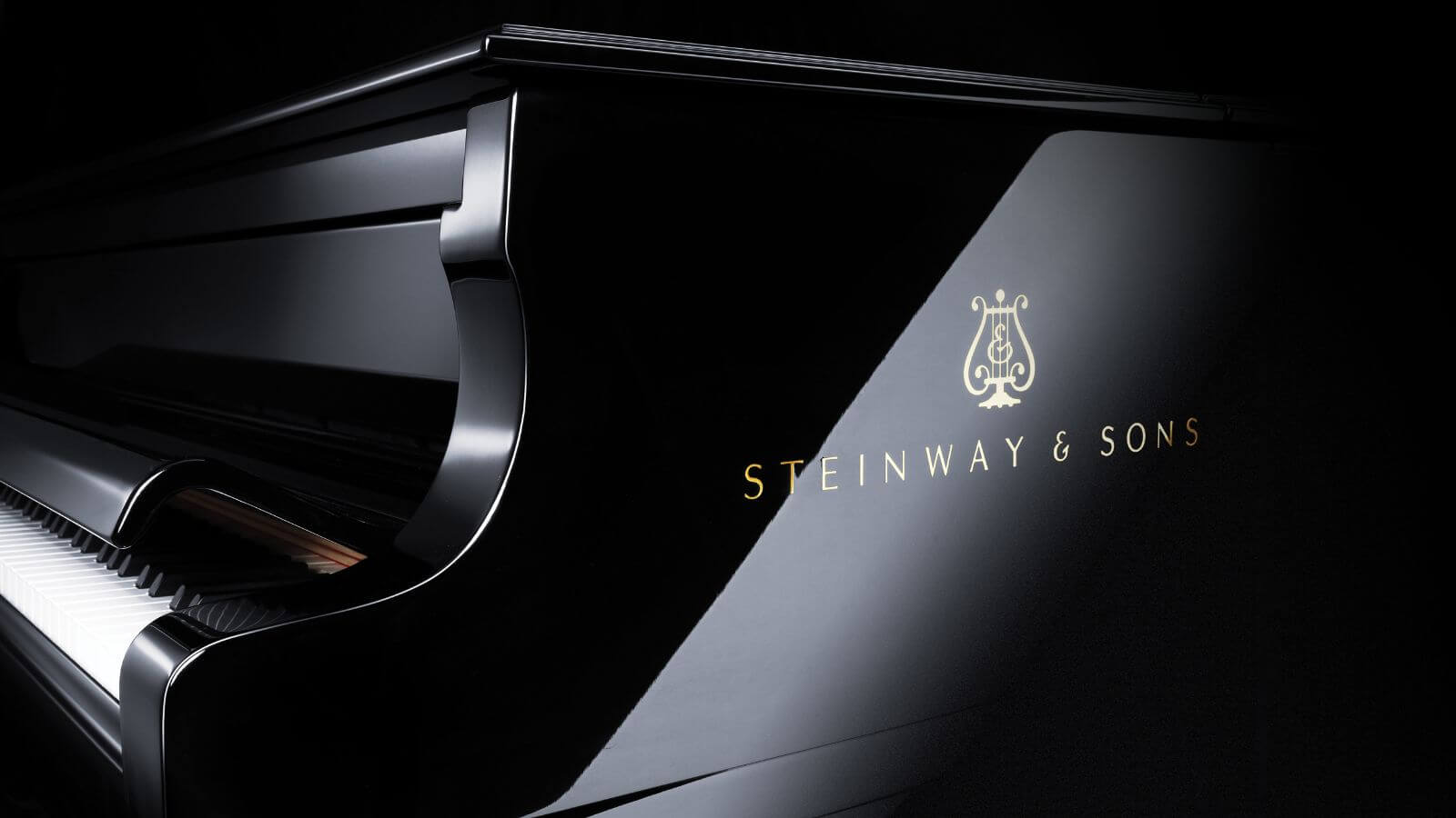 piano with logo of Steinway & Sons. Shows finish of the piano